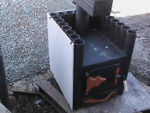 Видео: Испытание конвекционная  печка "Бриз" с   отделкой керамогранитом.Топка печки березовыми дровами. .