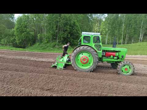 Видео: Трактор лтз т40 Фреза BOMET Virgo 1.6м Легко идет по Глинистые почвы - Год эксплуатации - 4k video