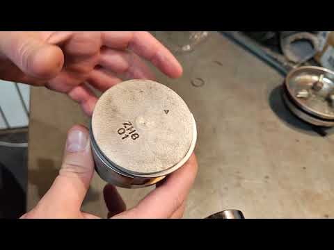 Видео: Как установить поршневые кольца на поршень