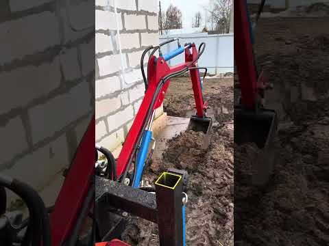 Видео: Минитрактор уралец экскаватор