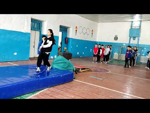 Видео: Сабақ тақырыбы: Гимнастикалық әртүрлі биіктіктегі сырықта жаттығулар жасау.  6-сынып.   Мұстафин.Н.М