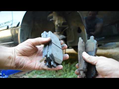 Видео: Lancer 9. Замена передних тормозных колодок и направляющих супорта.