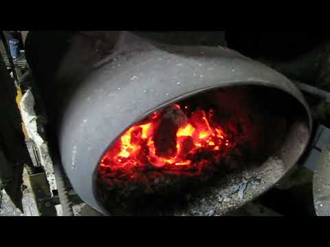 Видео: Чем отапливать гараж   дровами или топливными брикетами