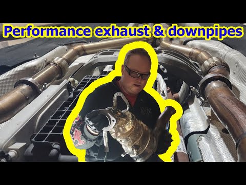 Видео: Снятие штатных приемных труб и установка новой выхлопной системы Ford Explorer ST 2020 года