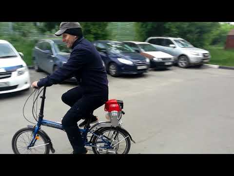 Видео: Велосипед с мотором от газонокосилки.