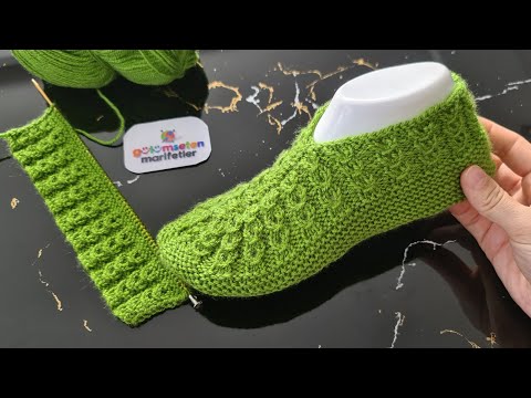 Видео: Новая схема вязания женских тапочек носков пинеток