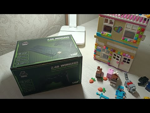 Видео: Game Stick Lite 4k V8.0 (Игровая палка) обзор, мнение.
