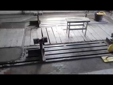 Видео: Стапель напольный для вытяжки автомобилей