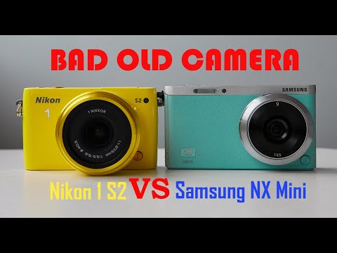 Видео: Дюймовые неудачники. Nikon 1 S2 vs Samsung NX Mini. Bad old Camera