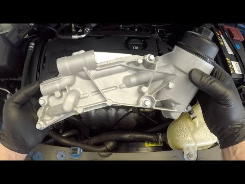 Видео: Замена масляного радиатора 1.8 Chevy Cruze Sonic Aveo Cobalt Holden Cruze Barina F18D4 или F16D4