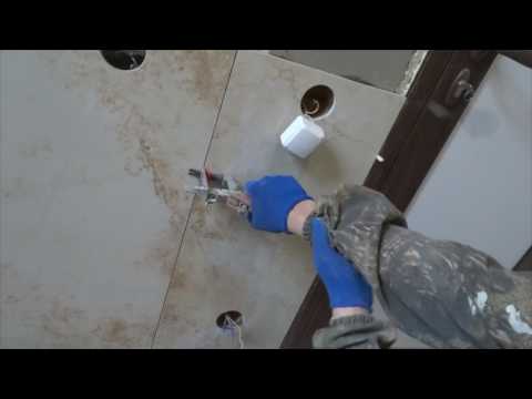 Видео: Как подогнать плитку к двери без наличников.