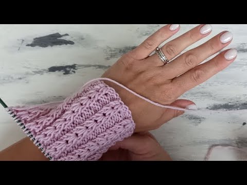 Видео: Красивый объемный узор спицами.