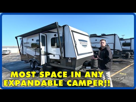 Видео: 3 выдвижных элемента и горка! 2024 Forest River Flagstaff Shamrock 233S