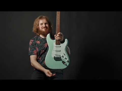 Видео: G&L Legacy серии Tribute - новейший страт среди классических электрогитар