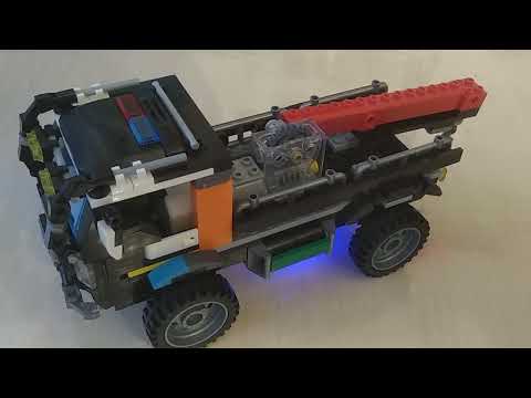 Видео: Обзор на моторизованный, подъёмный кран из lego