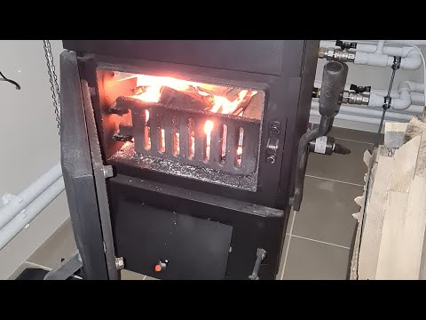 Видео: Твердотопливный котёл с бойлером косвенного нагрева на даче.