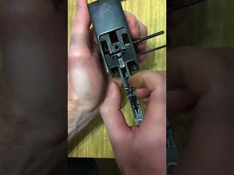 Видео: Замена боевой пружины ружья ИЖ-43М