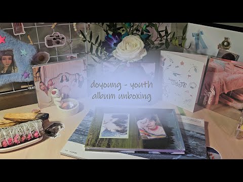 Видео: doyoung - youth album unboxing (pomal & spring ver.) + загадочная коробочка со стаффом