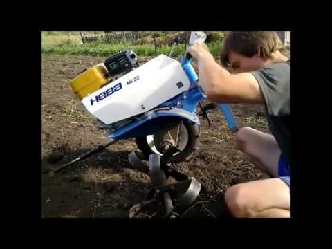 Видео: культивация высохшей земли мотоблок Нева мб 23