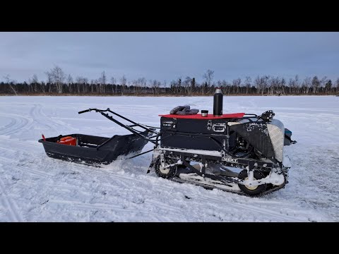 Видео: Мотобуксировщик ОМИЧ в деле.В поисках таёжного озера!