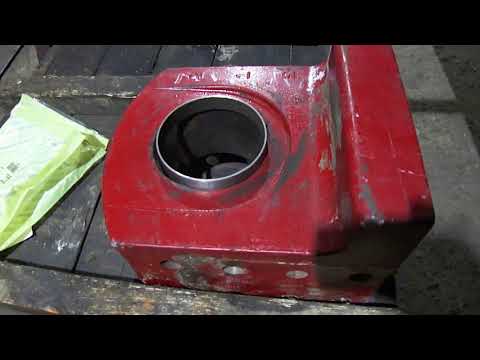 Видео: Ремонт оси качения заднего моста комбайна Case