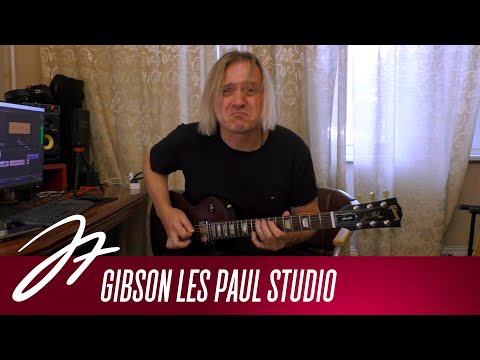 Видео: Обзор на диване - Gibson Les Paul Studio