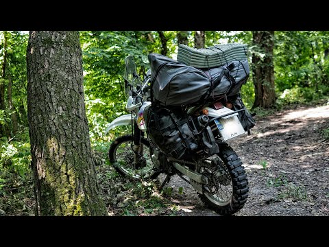 Видео: Мотоцикл для путешествий. Полевой обзор. Suzuki DR (Djebel)