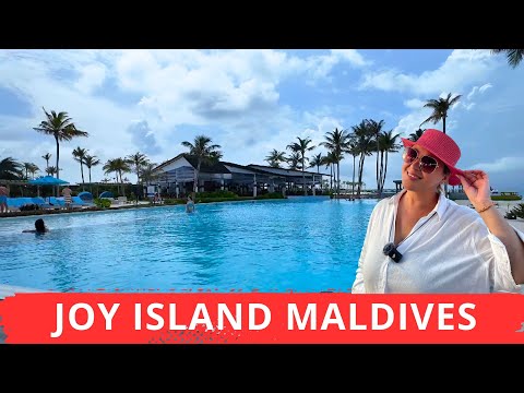 Видео: JOY ISLAND MALDIVES. Остров радости. Семейный, активный. Отличное питание. Красивая спокойная лагуна