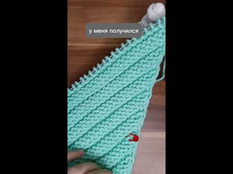 Видео: Шапка от угла спицами.