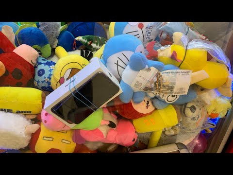 Видео: НАСТОЯЩИЙ АЙФОН И ДЕНЬГИ В АППАРАТЕ ХВАТАЙКА / КАК ВЫИГРАТЬ???