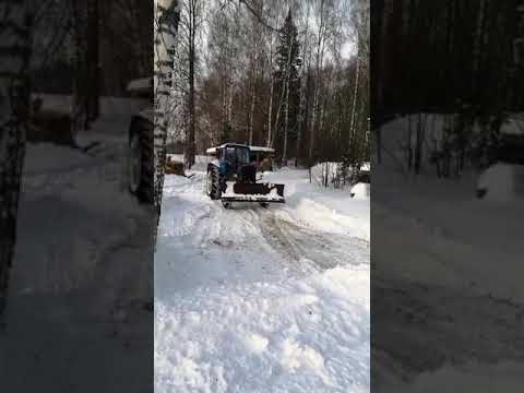 Видео: мтз 80 чистка снега отвалом