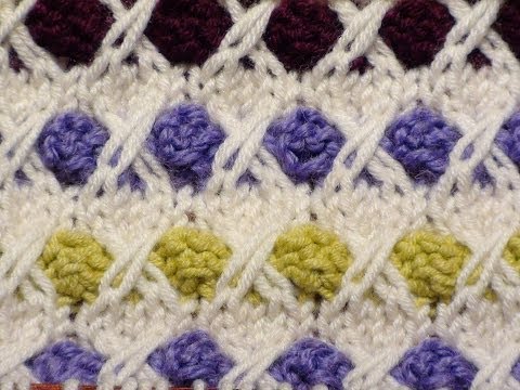 Видео: Узоры спицами. Разноцветные шишечки
