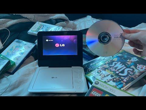 Видео: Вставка иностранных дисков в портативный DVD-плеер — БУДУТ ЛИ ОНИ РАБОТАТЬ?