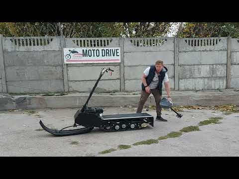 Видео: Мотоснегокат Снегирь . Мотобуксировщик, снегоход.