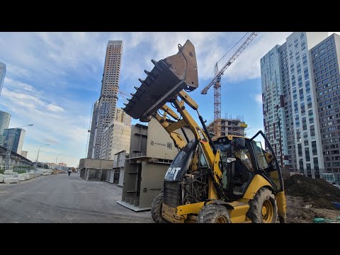 Видео: Технический осмотр перед покупкой: Caterpillar 432Е