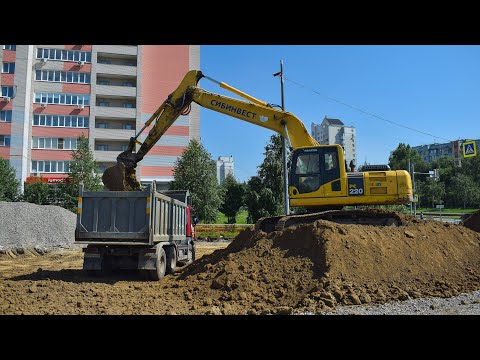 Видео: Экскаватор Komatsu PC220. Погрузка грунта в самосвалы/Komatsu PC220.Loading of soil into dump trucks