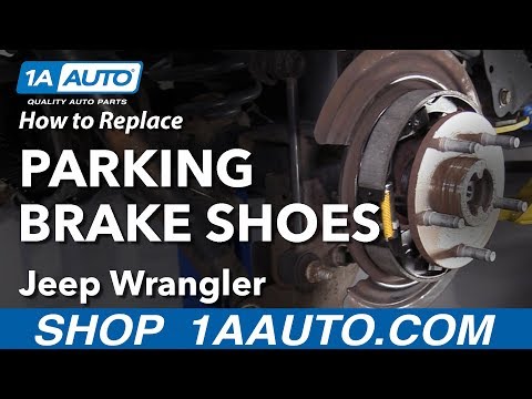 Видео: Как заменить колодки стояночного тормоза на Jeep Wrangler 06-18