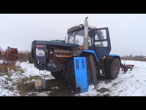 Видео: Мелкий ремонт двигателя на ХТЗ-17221 и снова пашем по снегу в 4 трактора.