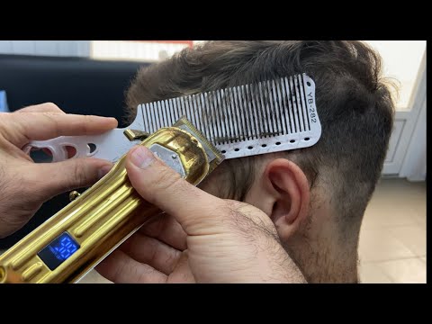 Видео: Машинка на расческе мужская стрижка