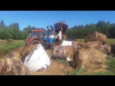 Видео: Вывоз старого сенажа и соломы в бурт