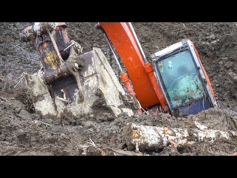 Видео: Вытаскиваем утонувший экскаватор без применения тяговой лебёдки. Часть первая.