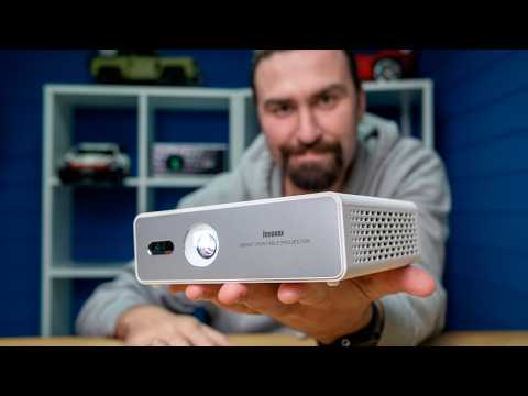 Видео: Автономный КИНОТЕАТР РАЗМЕРОМ С ЛАДОНЬ! Обзор DLP проектора Jenovox M5000 mini!