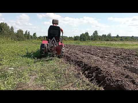 Видео: Минитрактор из мотоблока. Доработка плуга.