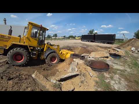 Видео: Демонтаж ёмкостей обычным погрузчиком