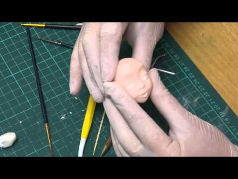 Видео: Лепка женской головы из сахарной мастики 2 часть