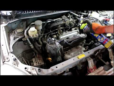Видео: Замена свечей зажигания на Toyota Duet 1,0 Тойота Дуэт 2000 года
