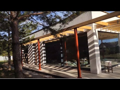 Видео: Дом с плоской кровлей