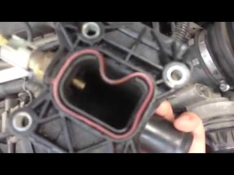 Видео: Ford Mondeo 4 2.3 замена тройника системы охлаждения