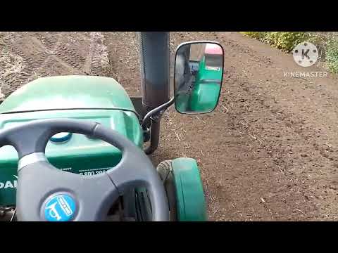 Видео: Минитрактор файтер т22. Отвалилось задние колесо. Убираю батву и начинаю культивировать. 