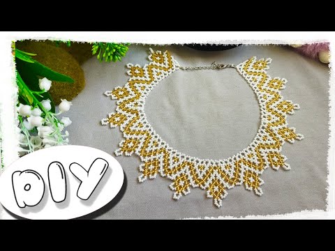Видео: DIY БЕЛО-ЗОЛОТИСТОЕ КОЛЬЕ из бисера. Бисероплетение